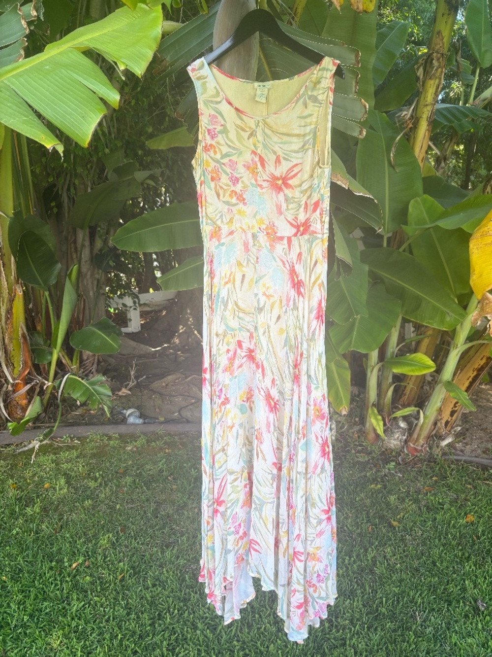 Sundance/4/floral sleeveless lined dress with swishy, feminine uneven hemline
